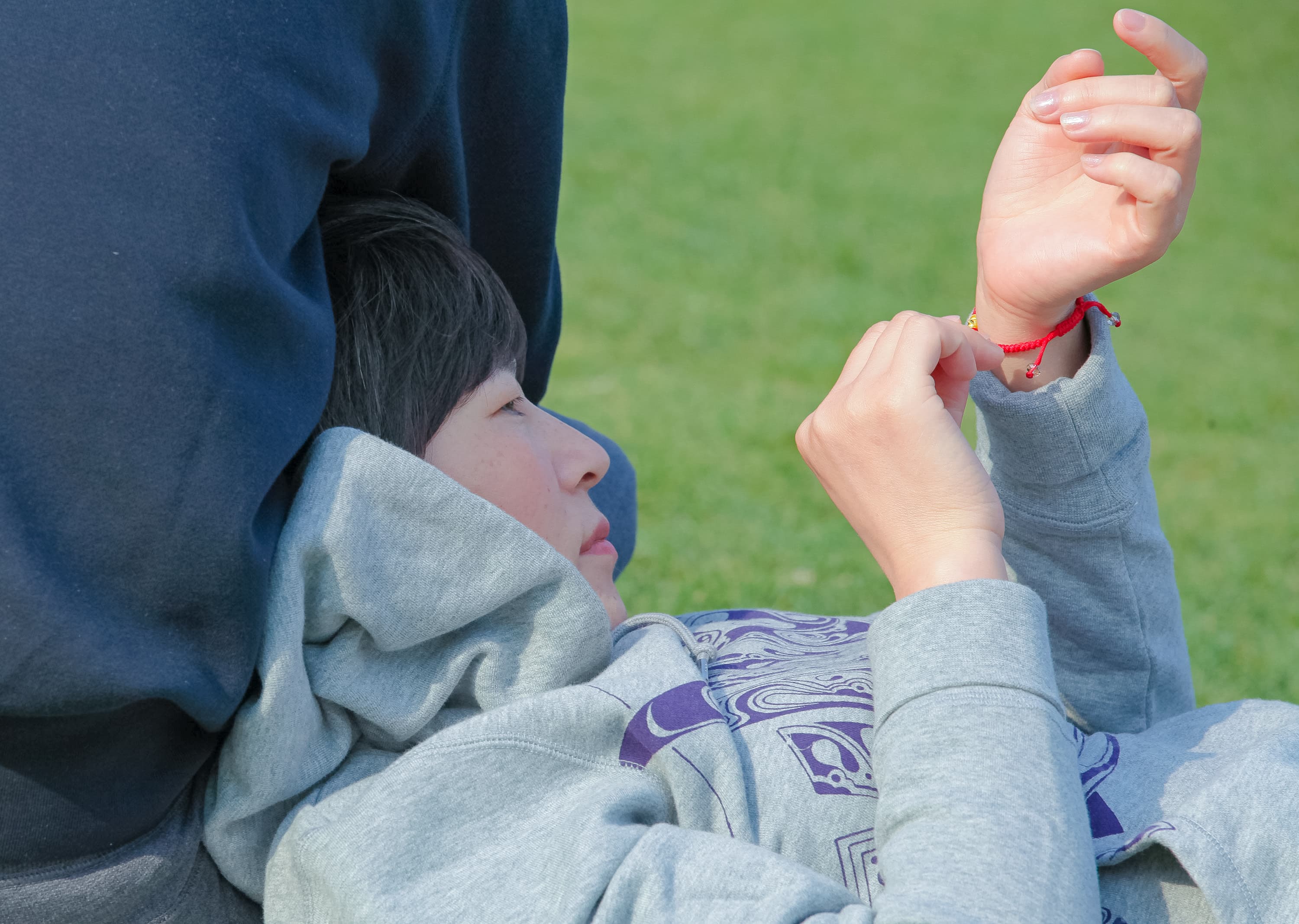 Sheer pantyhose on sunlit legs